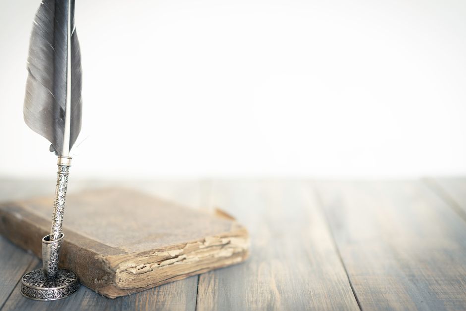 Close-up shot of stacked vintage books with soft focus on pages, perfect for educational themes.